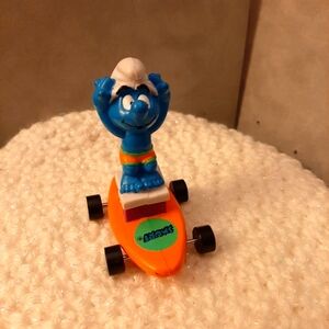 Smerf skate boarding vintage toy